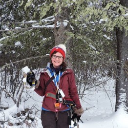 Siobhan Darlington with a trail camera.