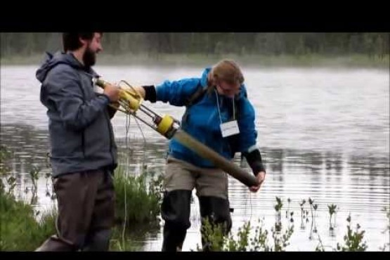 Vanessa Stretch explains how a gravity core works for sampling sediment - Burning Issues Field Tour