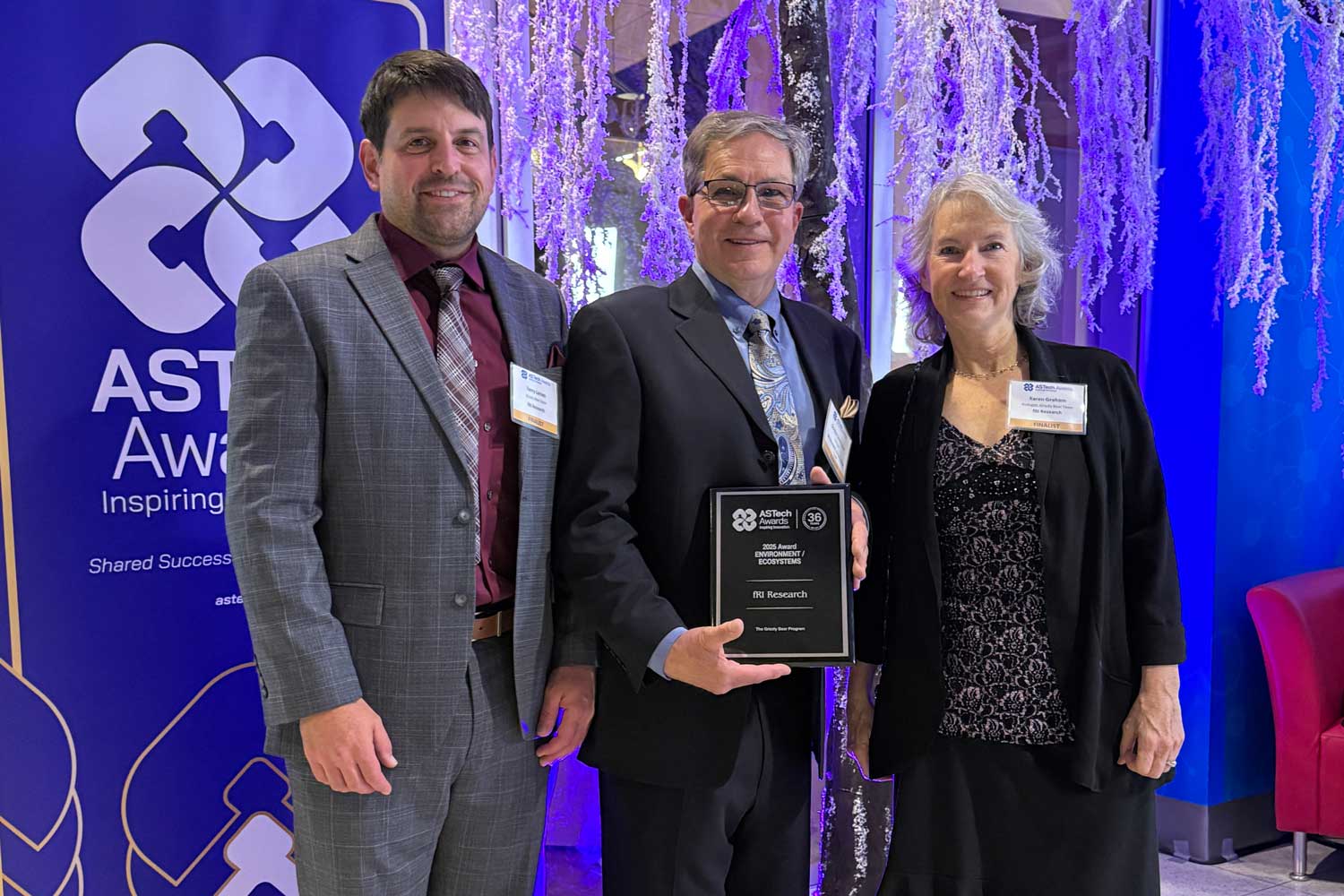Terry Larsen, Gord Stenhouse, and Karen Graham with their 2025 ASTech Award in Calgary