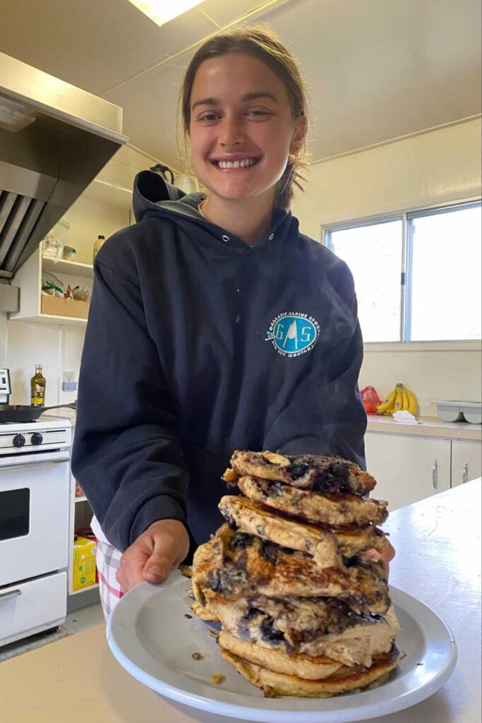 Sierra with a stack of pancakes